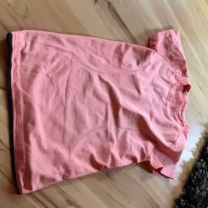 Lululemon swiftly size 2 orange with navy trim at bottom